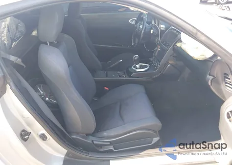 2004 Nissan 350Z Enthusiast z USA, uszkodzony, nr VIN JN1AZ34D14M101414